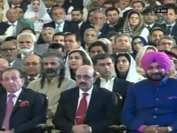 Sidhu hugs Pak Army chief, sits next to PoK head at Imran's swearing in