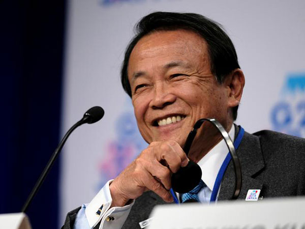 Aso urges China to help make rules on loan offers