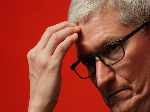Tim Cook 'thrilled' Berkshire's Buffett owns Apple stock