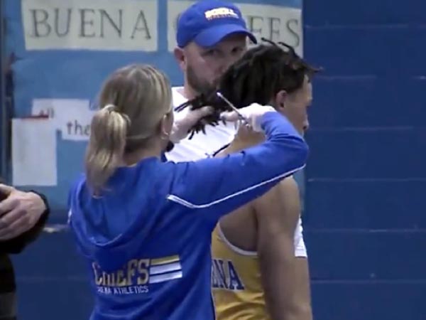 Referee makes wrestler cut dreadlocks or forfeit match