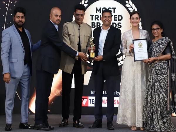 Satpal Singh, CEO of Numeric (third from right) receiving the Most Trusted Brands of India-2022 award from Team Marksmen
