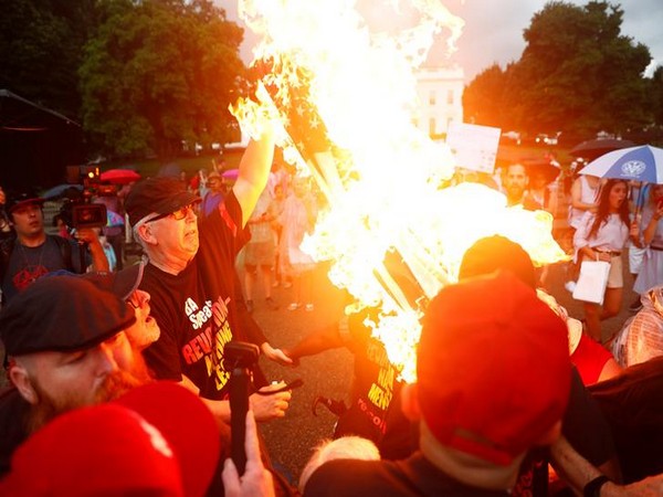 US flag burned outside White House on Independence Day, 2 protesters arrested