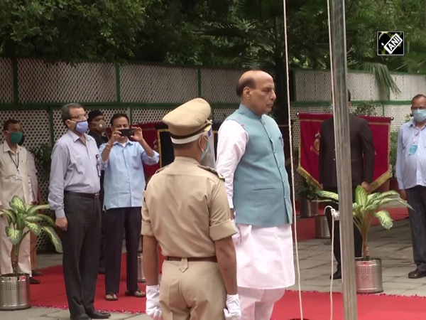 74th I-Day: Defence Minister Rajnath Singh hoists tricolour at his residence