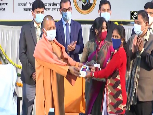 CM Yogi distributes smartphones to ASHA workers for COVID control efforts