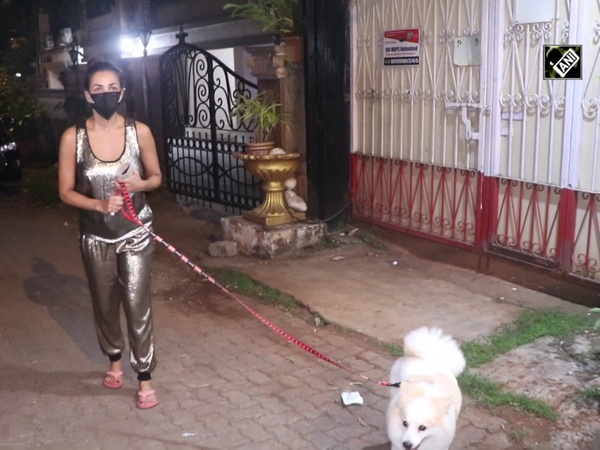 Malaika Arora walks her dog in style