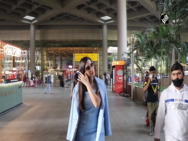 Nora Fatehi brightens up Mumbai airport in light blue dress