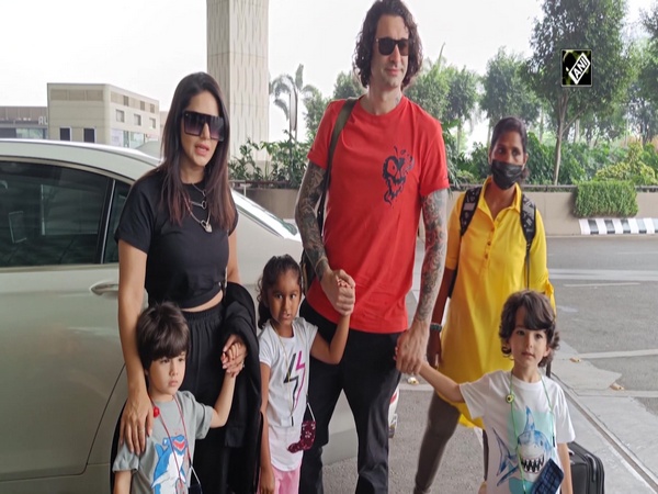 Sunny Leone opts for casual look as she gets papped with family at Mumbai airport