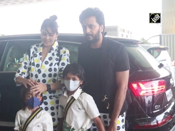 Riteish Deshmukh, Genelia D'Souza papped with kids at Mumbai airport