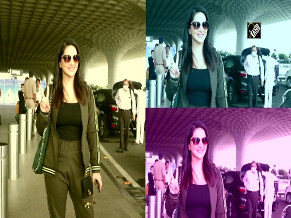 Baby Doll Sunny Leone clicked at airport in Mumbai