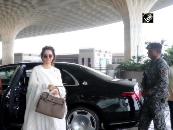 Kangana Ranaut looks ethereal in her pearly white attire at Mumbai airport