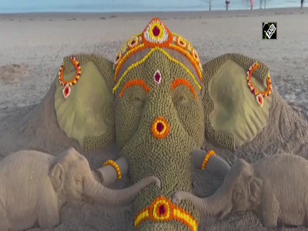 Odisha sand artist Sudarsan Pattnaik creates Ganesha sculpture at Puri beach