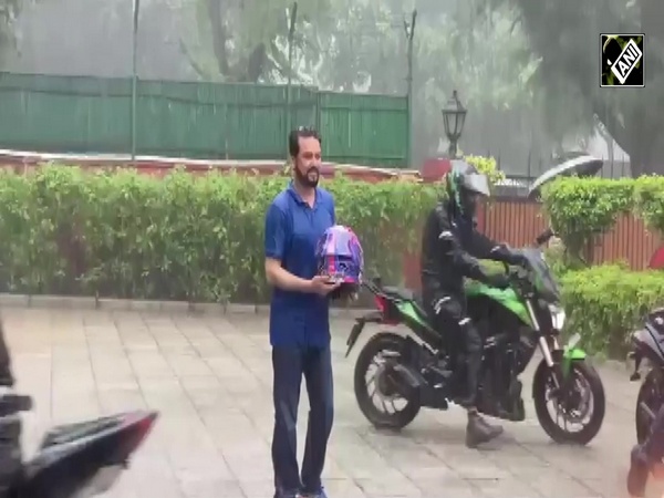 Union Minister Anurag Thakur shows his biker avatar, joins MotoGP riders amid rains