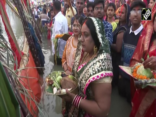 Devotees gather to offer "Argha" to rising Sun as they observe Chhath Puja