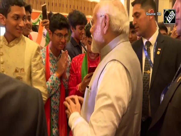 COP28: PM Modi greets Members of Indian Diaspora gathered at a hotel in Dubai