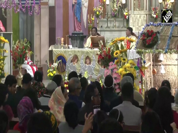 Devotees throng to churches to offer prayers at midnight, celebrate Christmas with joy