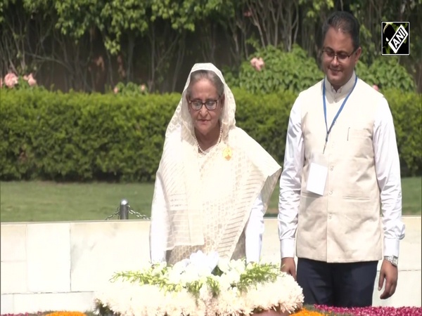 New Delhi: Bangladesh PM Sheikh Hasina pays tribute to Mahatma Gandhi at Rajghat