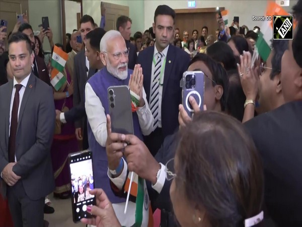 PM Modi greets Indian Diaspora after he lands in Austria