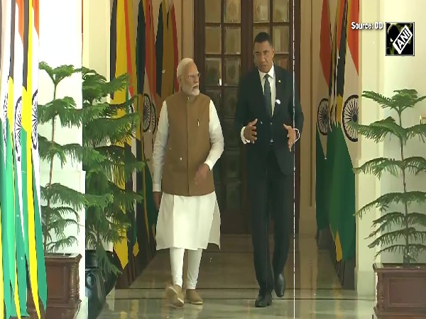 Prime Minister Narendra Modi meets Jamaican PM Andrew Holness at Hyderabad House in Delhi