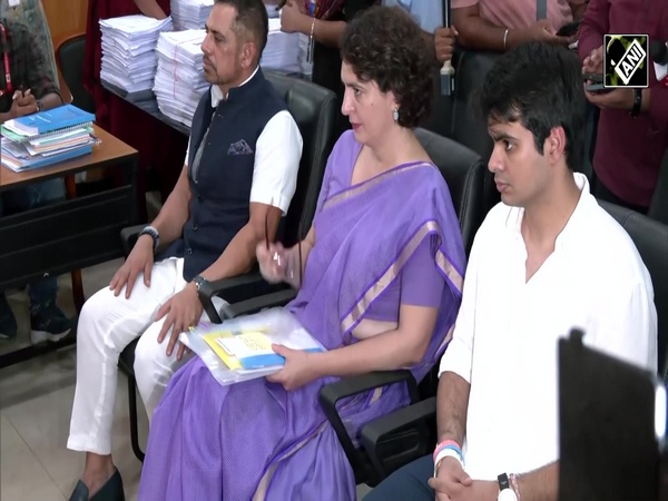 Priyanka Gandhi Vadra flanked by son Raihan Vadra and husband Robert Vadra files her nomination