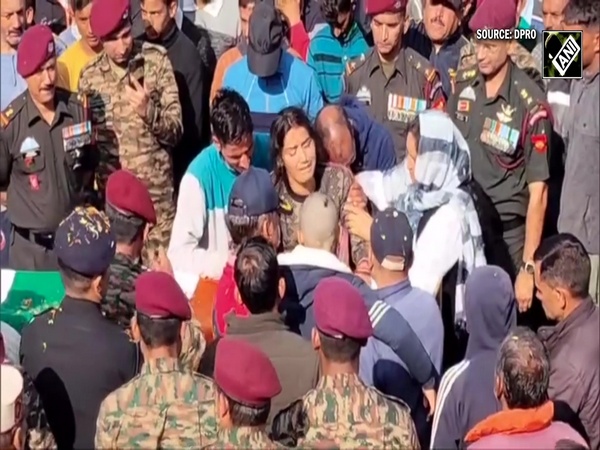 Son bid adieu to father Naib Subedar Rakesh Kumar with teary eyes who lost live in Kishtwar enc