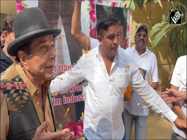 Dharmendra cuts cake, poses with fans on his 89th birthday