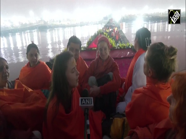 Foreign devotees sing Hanuman Chalisa as they head Triveni Sangam for Amrit Snan on Basant Panchami