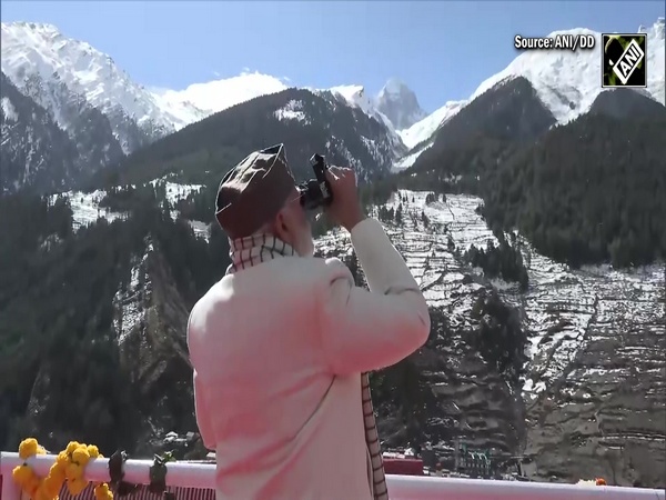 PM Modi puts on binoculars, enjoys beauty of snow-capped mountains in Mukhwa, Uttarakhand