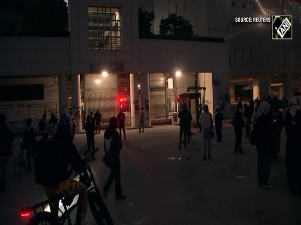Protesters, law enforcement exchange fireworks and tear gas in Los Angeles