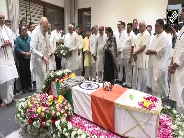 Home Minister Amit Shah with Gujarat CM Bhupendra Patel pay tribute to former CM Vijay Rupani