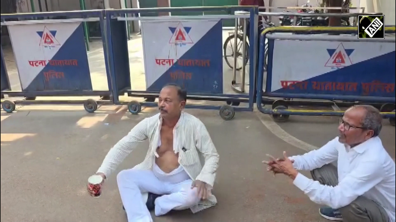 Denied ticket, RJD’s Madan Shah tears clothes, breaks down; high drama outside Lalu Yadav’s home