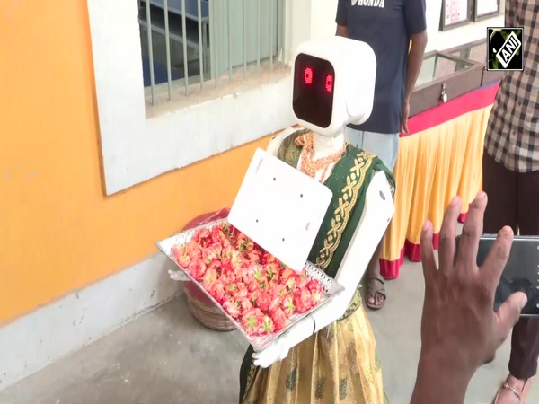 Robot Nila, an event-based robot greets voters as she remains on election duty in Puducherry