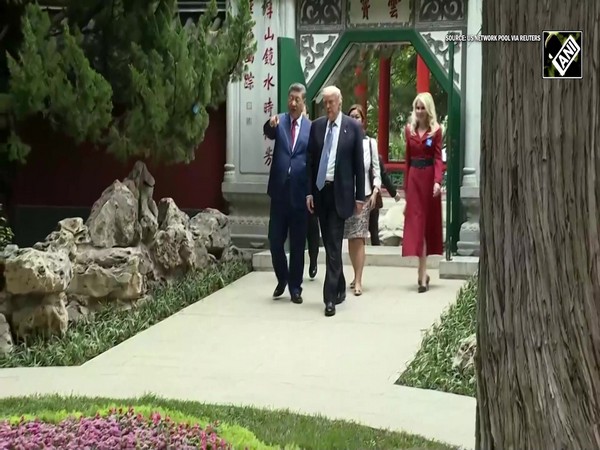 Xi Jinping guides President Trump on a tour of Zhongnanhai historic garden ; gifting seeds of ROSES