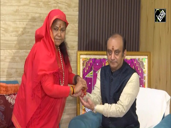 NCBC Chairperson Sadhvi Niranjan Jyoti ties Rakhi to BJP MP Sudhanshu Trivedi on Raksha Bandhan