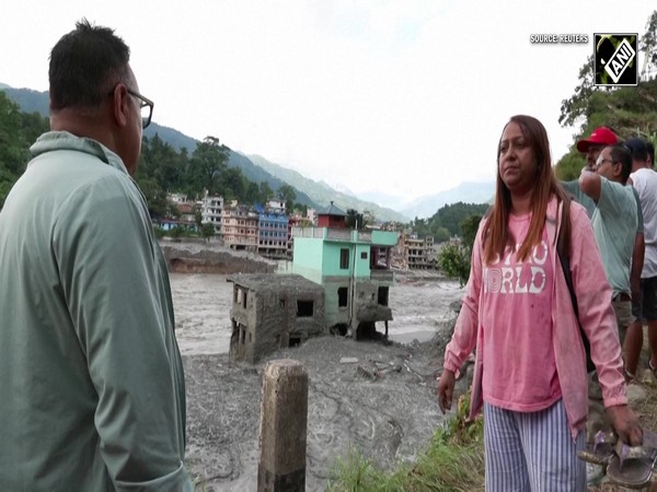 Nepal ‘deadly’ Floods: Turquoise house survives as residents return to assess devastation