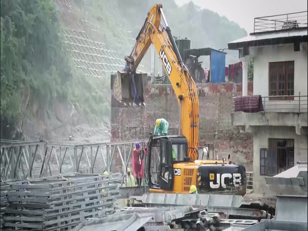 Nepali army begins construction on makeshift bridge in flood-ravaged town of Devighat