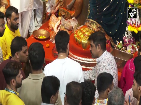 Indian cricketer Rohit Sharma and wife Ritika Sajdeh offer prayers at Lalbaugcha Raja Ganpati pandal