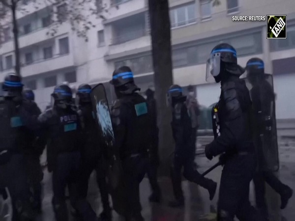 Paris tensions rise as massive march over living standards ends in clashes with riot police
