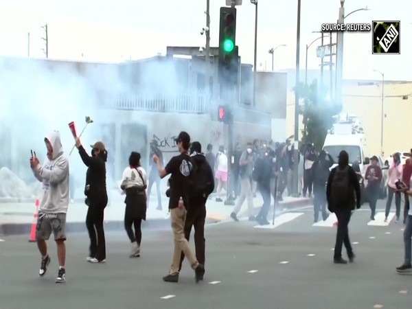 Tear gas fills LA streets as protesters clash with police following ICE raids in Los Angeles