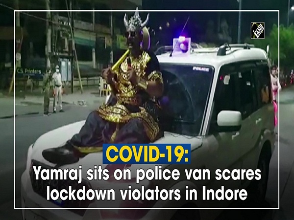 COVID-19: Yamraj sits on police van scares lockdown violators in Indore