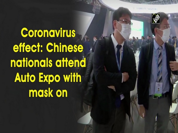 Coronavirus effect: Chinese nationals attend Auto Expo with mask on