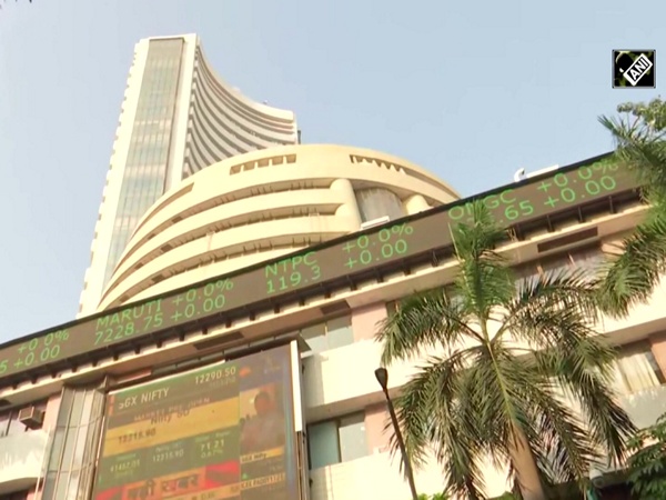 Equities close in the green after volatile session