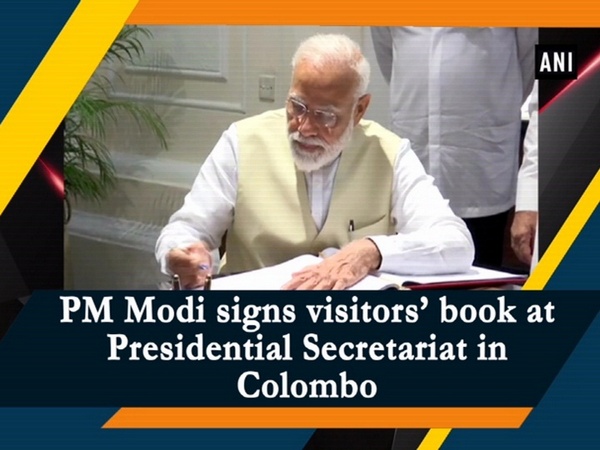 PM Modi signs visitors’ book at Presidential Secretariat in Colombo