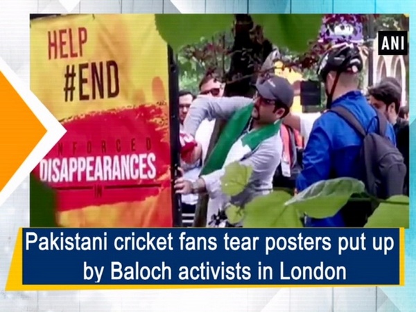 Pakistani cricket fans tear posters put up by Baloch activists in London