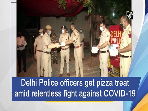 Delhi Police officers get pizza treat amid relentless fight against COVID-19