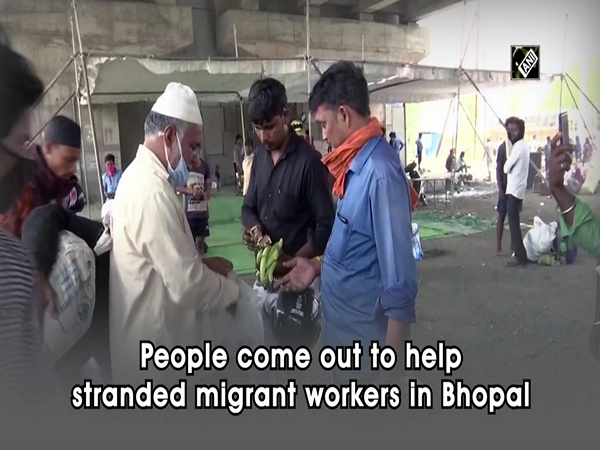 People come out to help stranded migrant workers in Bhopal