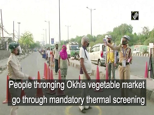 People thronging Okhla vegetable market go through mandatory thermal screening