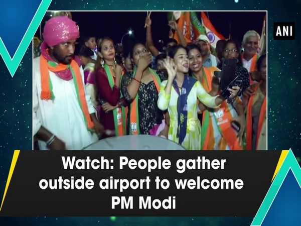 Watch: People gather outside airport to welcome PM Modi