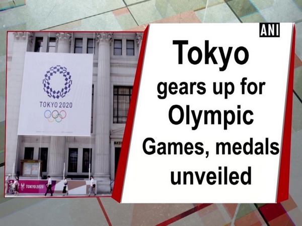 Tokyo gears up for Olympic Games, medals unveiled